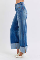 Close-up of the distressed detailing on Judy Blue High-Waist Wide-Leg Jeans, adding a stylish, worn-in look for a trendy appearance.