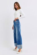 Model wearing Judy Blue High-Waist Wide-Leg Jeans, front view, ideal for casual outings or stylish office wear with a modern wide-leg cut.